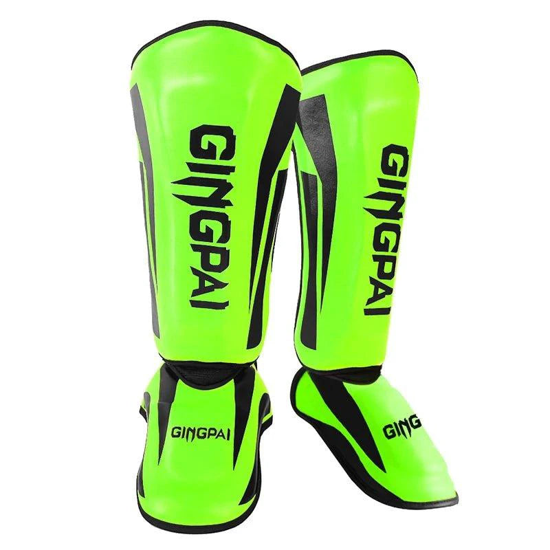 Mandotos kickboxing shin guards for Muay Thai, featuring padded leg protectors and adjustable straps for secure fit during training.