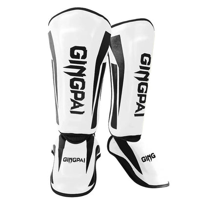 Mandotos kickboxing shin guards and Muay Thai leg protectors showing padded design for impact protection during training.