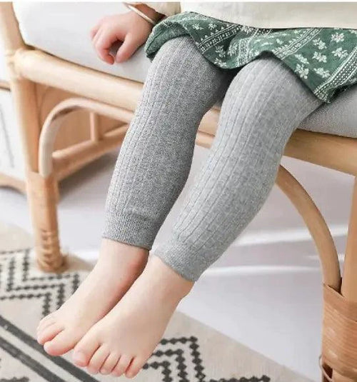 Kids Flexi-Crop Casual Pants by MANDOTOS, lightweight denim with elastic waistband and rolled-up cuffs, perfect for playful kids.