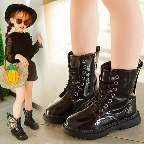 Kids winter shoes by MANDOTOS featuring waterproof design, warm lining, and durable rubber soles for winter outdoor wear.