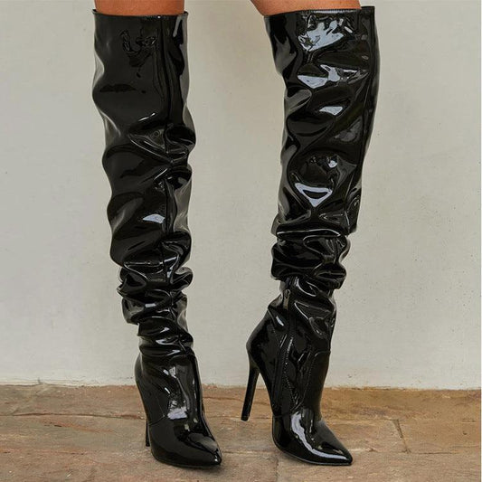 Mandotos knee-high long boots for women featuring a super high heel, stylish for fashion and party occasions.