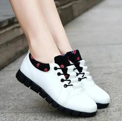 Mandotos Korean Student Shoes featuring classic black design with white soles, comfortable slip-on style for everyday wear.