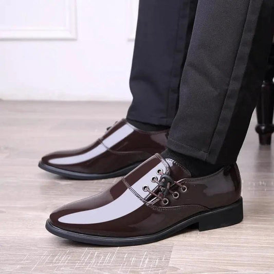 Mandotos men's lace-up leather business casual shoes, black with sleek design and sturdy soles for professional or casual wear.