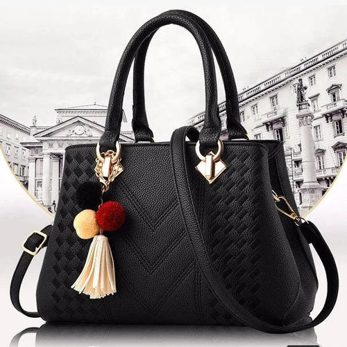 Luxury MANDOTOS women's crossbody handbag with sleek design and spacious interior, perfect for stylish everyday use.