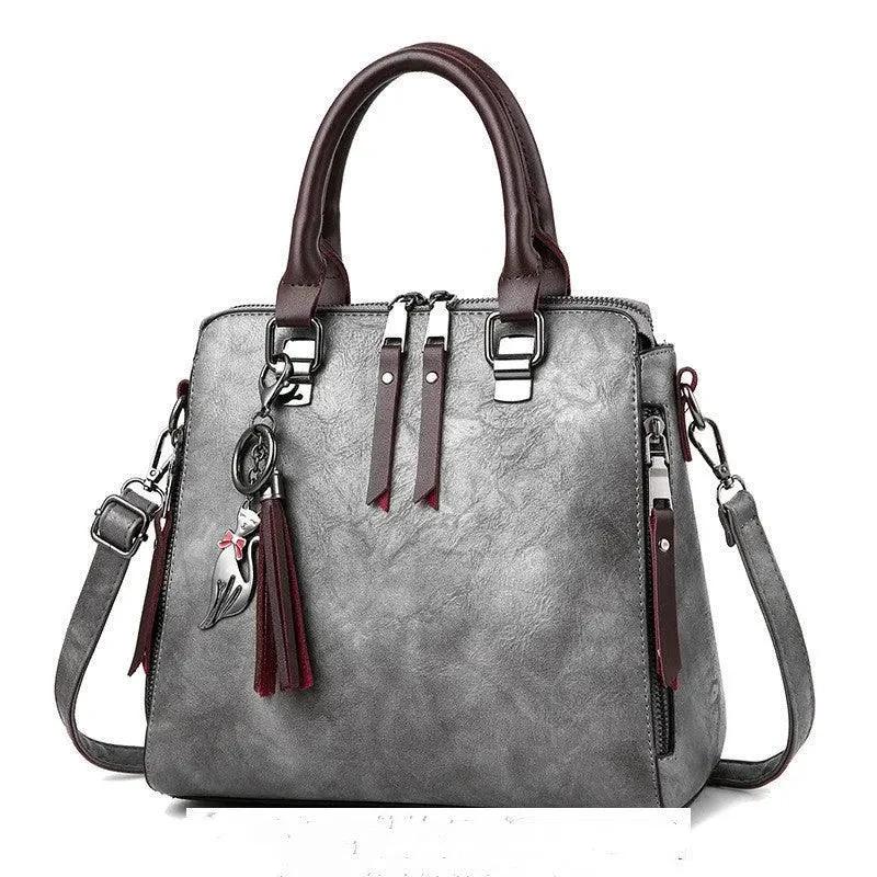 Luxury MANDOTOS ladies' crossbody handbag with elegant design and spacious interior, perfect for women’s fashion accessories.
