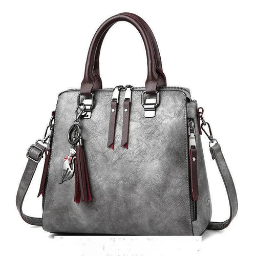 Luxury MANDOTOS ladies' crossbody handbag with elegant design and spacious interior, perfect for women’s fashion accessories.