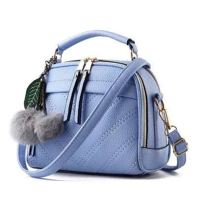 Elegant MANDOTOS ladies' luxury leather handbag with gold hardware and stylish design, perfect for sophisticated fashion.