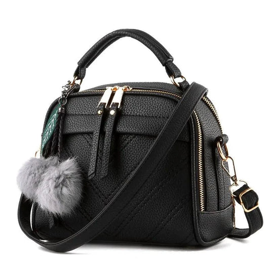 Elegant ladies' luxury leather handbag by MANDOTOS with sleek design and high-quality craftsmanship.