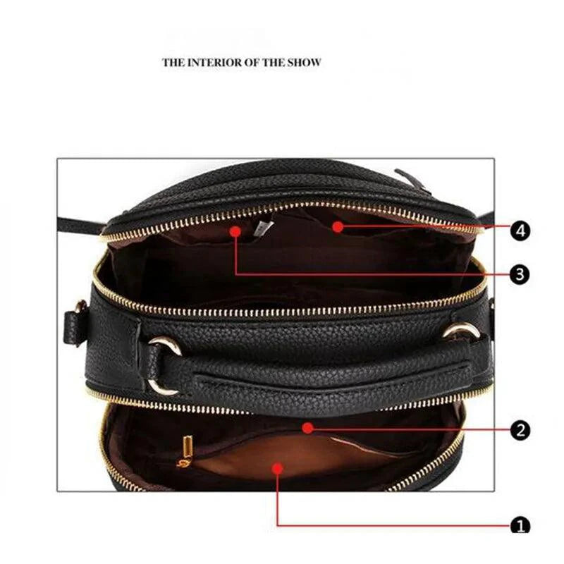 Elegant ladies' luxury leather handbag by MANDOTOS with gold-tone hardware and structured design.