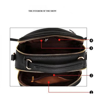 Elegant ladies' luxury leather handbag by MANDOTOS with gold-tone hardware and structured design.