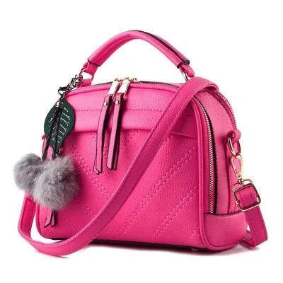 Elegant ladies' luxury leather handbag by MANDOTOS featuring a sleek design and high-quality craftsmanship.