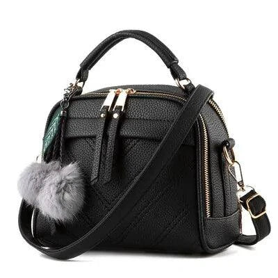 Elegant ladies' luxury leather handbag by MANDOTOS featuring a sleek design and high-quality craftsmanship.