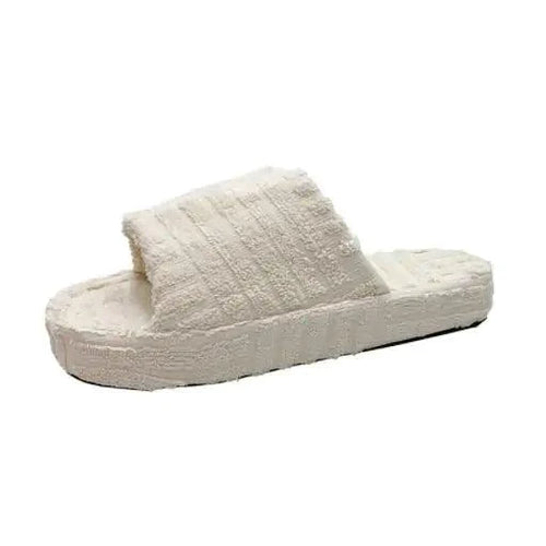 Soft beige MANDOTOS ladies' plush slip-on slippers with cozy interior and non-slip soles for comfortable indoor wear.