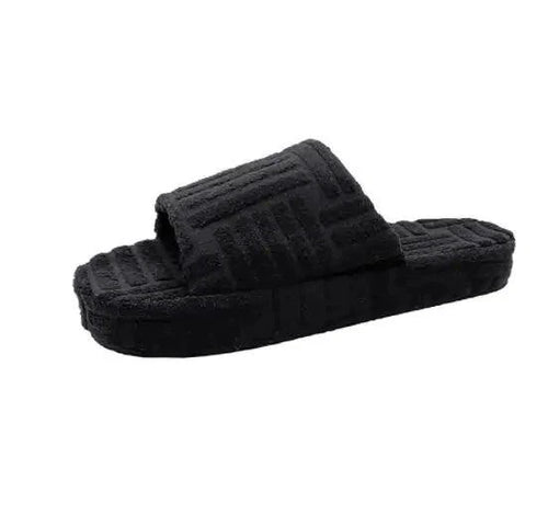 Comfortable ladies' plush slip-on slippers by MANDOTOS with soft, cozy fabric and slip-on design for indoor wear.