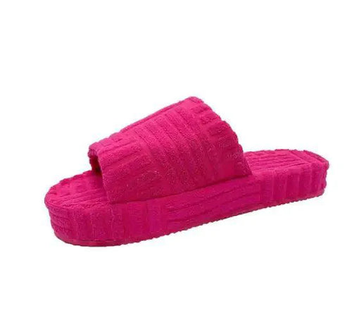 Comfortable ladies' plush slip-on slippers by MANDOTOS with soft fabric and cozy design for indoor wear.