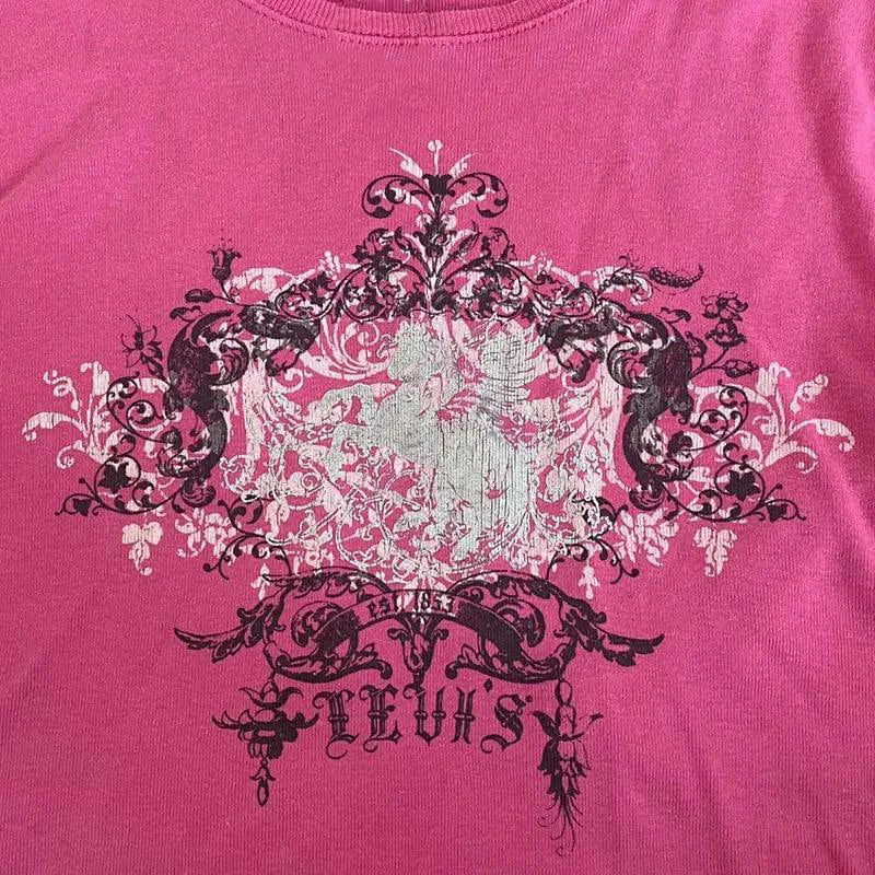 Ladies' retro print crop tee by MANDOTOS featuring vibrant vintage-inspired design and casual fit.