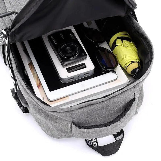 Mandotos laptop backpack with USB charging port, durable fabric, multiple compartments, and padded shoulder straps for comfort.