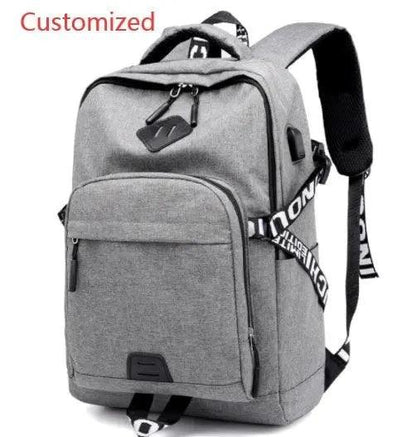 Mandotos laptop backpack with USB charge port, black nylon design, multiple compartments, and padded shoulder straps for travel and work.