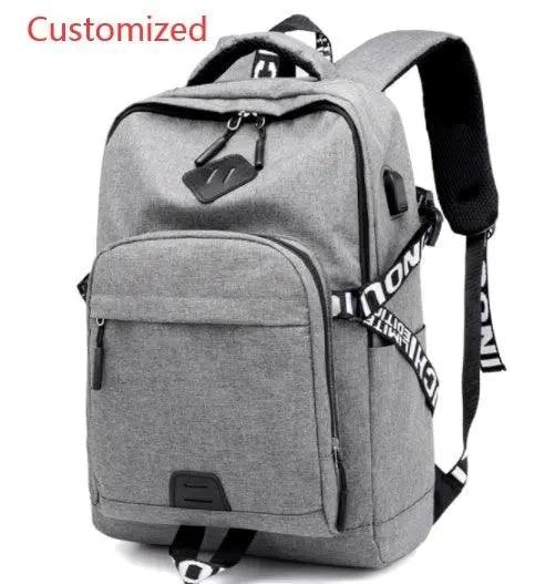 Mandotos laptop backpack with USB charge port, black nylon design, multiple compartments, and padded shoulder straps for travel and work.