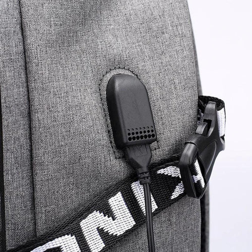 Mandotos laptop backpack with USB charging port, black, featuring padded compartments and adjustable straps for travel and daily use.