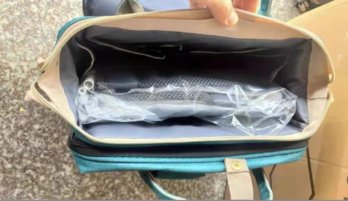 Large capacity MANDOTOS mommy bag with multiple compartments, stylish design, and sturdy handles for moms on the go.