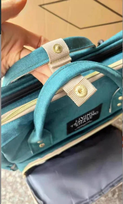 Large-capacity MANDOTOS Mommy Bag with multiple compartments, durable fabric, and stylish design for busy moms.