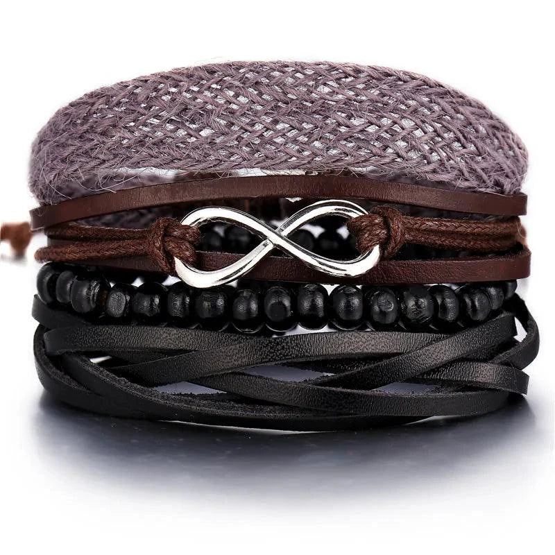 Layered leather charm bracelet by MANDOTOS featuring multiple leather strands and metal charm accents.