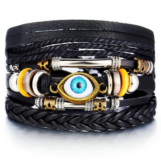 Mandotos layered leather charm bracelet with metal and leather accents, featuring multiple charms and a stylish design.