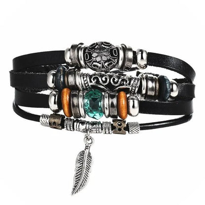 Mandotos layered leather charm bracelet with metal and leather accents, stylish accessory for casual or boho outfits.
