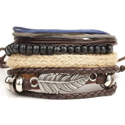 Layered leather charm bracelet by MANDOTOS featuring multiple leather strands and decorative metal charms.