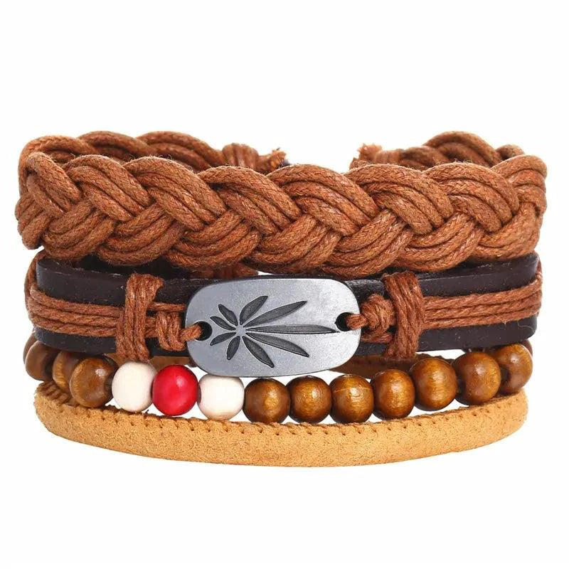 Layered leather charm bracelet by MANDOTOS featuring multiple leather strands and decorative metal charms.