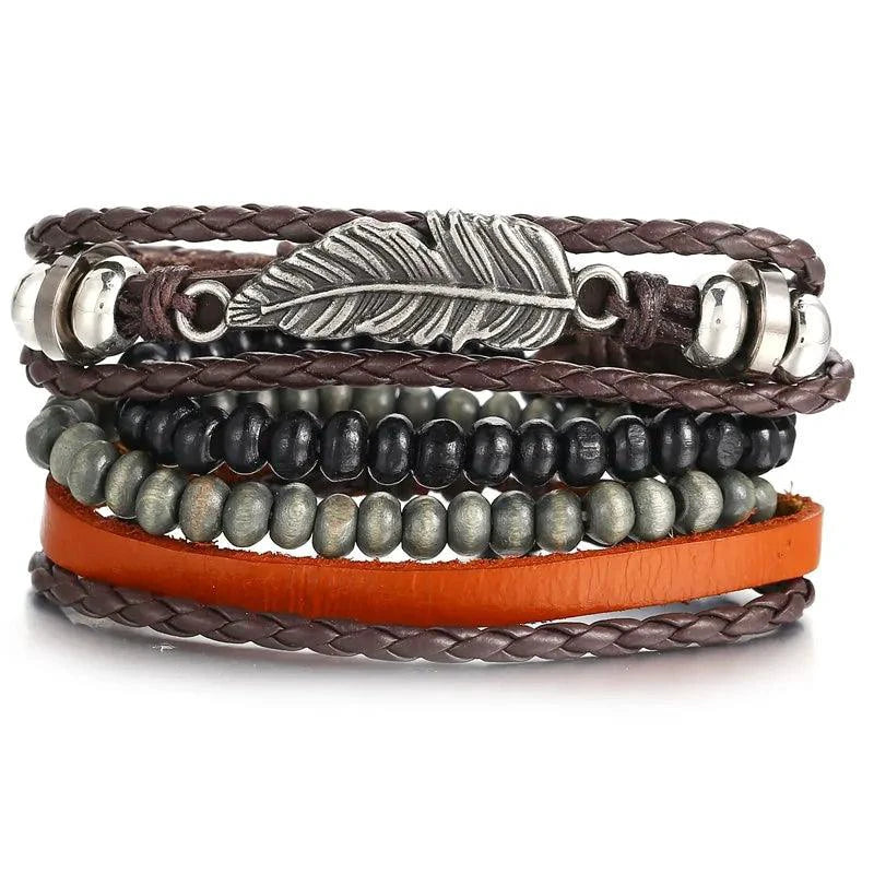 Mandotos layered leather charm bracelet with multiple leather bands and metal charm accents on a neutral background.