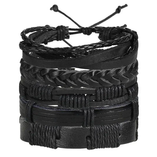 Layered leather charm bracelet by MANDOTOS featuring multiple leather strands and metal charms on a neutral background.