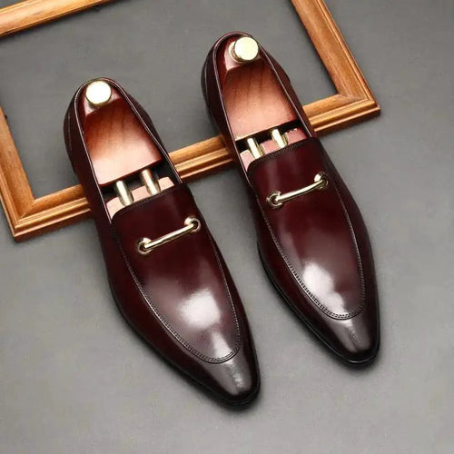 Mandotos men's leather loafers featuring classic slip-on design and polished finish for stylish and comfortable wear.