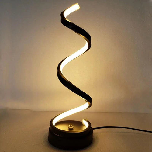 Mandotos LED Elegance Spiral Desk Light with sleek design and adjustable brightness on a modern workspace.
