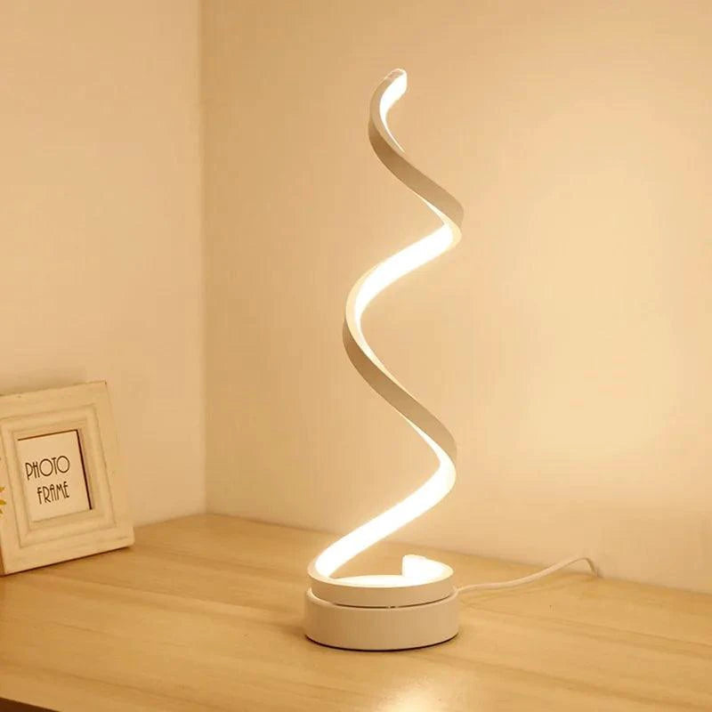 Mandotos LED Elegance Spiral Desk Light with sleek design and adjustable brightness on a modern workspace.