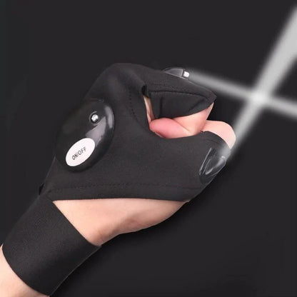 Mandotos LED fingerless adventure glove with built-in light, black fabric, and adjustable strap for outdoor activities and nighttime use.