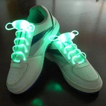 Mandotos LED light-up shoelaces glowing in the dark, vibrant and flexible for stylish, illuminated footwear.