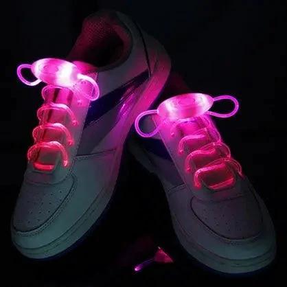 Mandotos LED light-up shoelaces glowing in the dark, colorful and flexible for sneakers or casual shoes.
