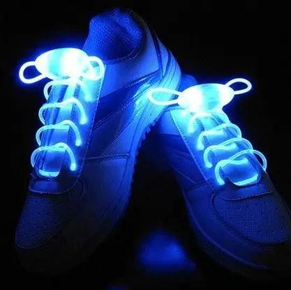 Mandotos LED light-up shoelaces glowing in the dark, vibrant and colorful laces for sneakers and athletic shoes.