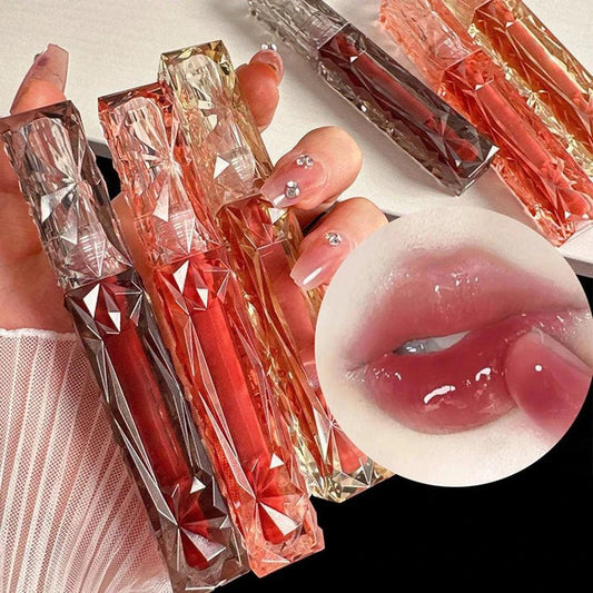 Mandotos long-lasting lip gloss with moisturizing, waterproof formula and mirror finish, visible on lips in the image.