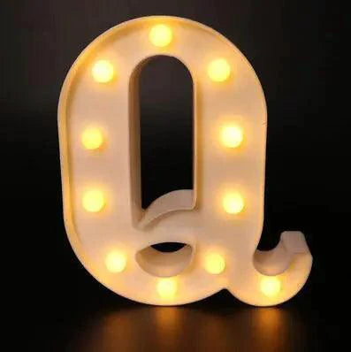Mandotos luminous letter lights spelling out "LOVE" on a wall, decorative LED illuminated alphabet lights for room decor