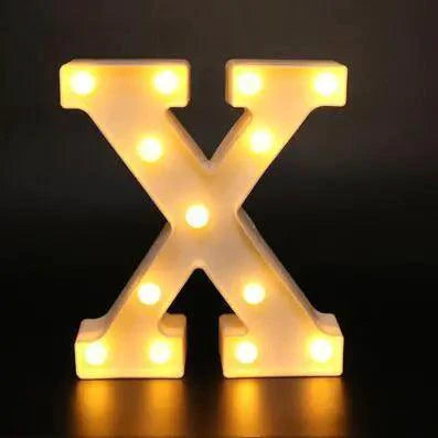 Mandotos luminous letter lights spelling out a word, illuminated with warm white glow, suitable for decorative room lighting.