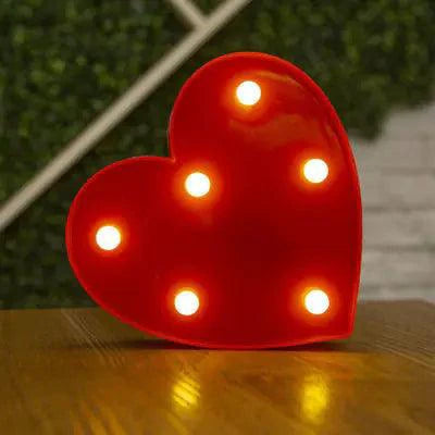Mandotos luminous letter lights spelling out decorative letters on a wall, ideal for room decor and ambient lighting.