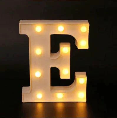 Mandotos luminous letter lights spelling out decorative characters on a wall, ideal for home decor and ambient lighting.