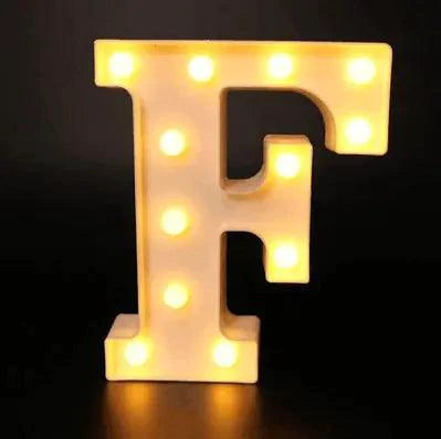 Mandotos luminous letter lights spelling out a word, glowing softly with warm white light, ideal for decorative room lighting.