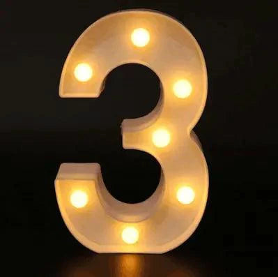 Mandotos luminous letter lights spelling out "Love" in warm white glow, ideal for bedroom or party decor.