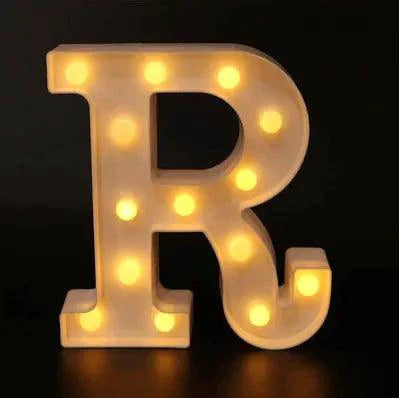 Mandotos luminous letter lights spelling out a word, illuminated in a cozy indoor setting, perfect for home decor or room decoration.