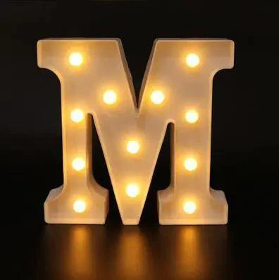 Mandotos luminous letter lights spelling out words, glowing soft white, decorative indoor lighting for home decor and ambiance.