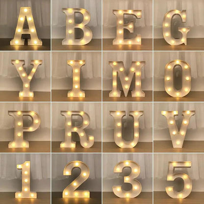 Mandotos luminous letter lights spelling out a word, warm glow, mounted on a wall for decorative ambient lighting.